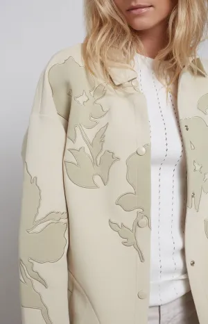 Long scuba jacket with long sleeves, press studs and florals