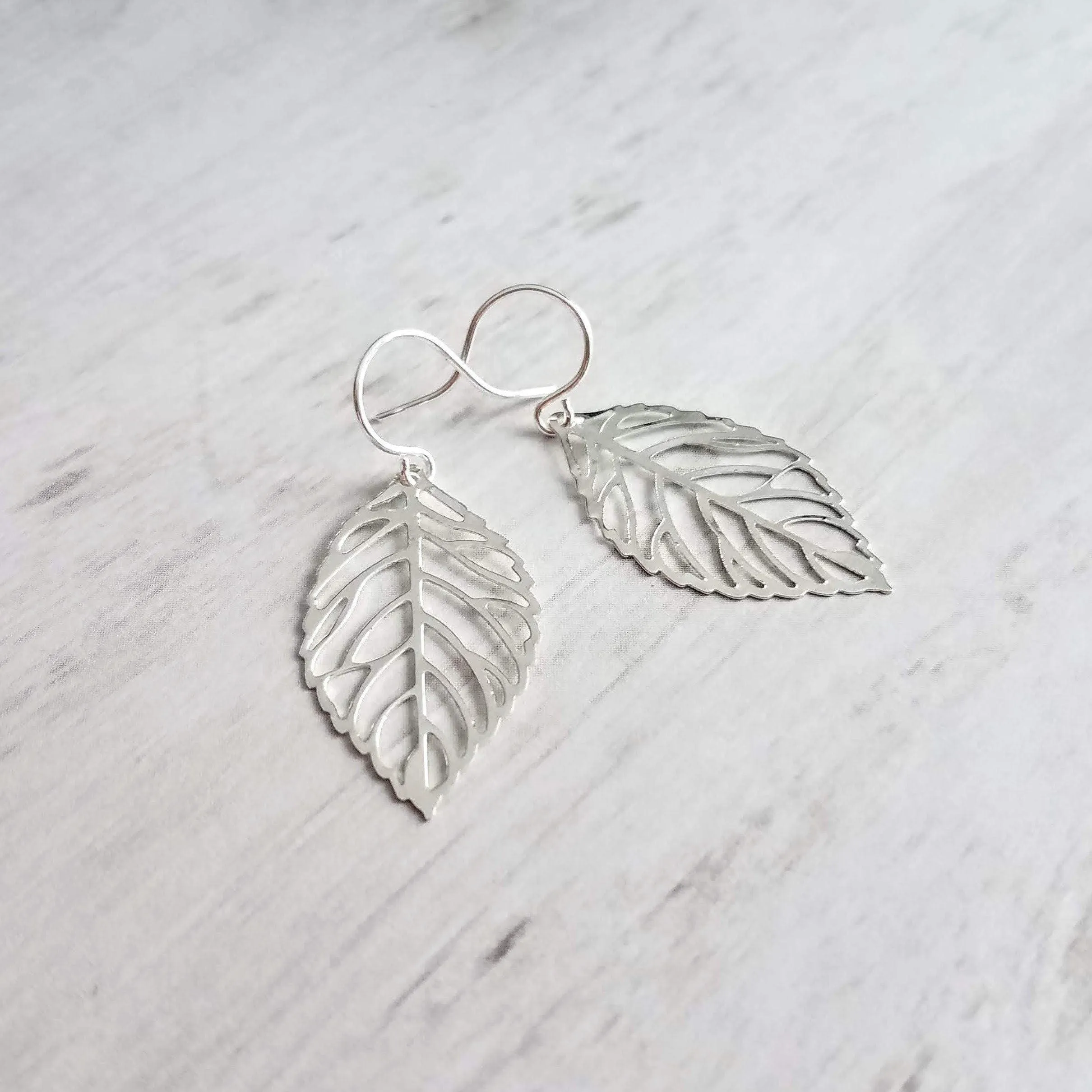 Silver Leaf Earrings - thin wispy modern outline filigree leaves - delicate cut out design - 14K SOLID GOLD or filled hook upgrade