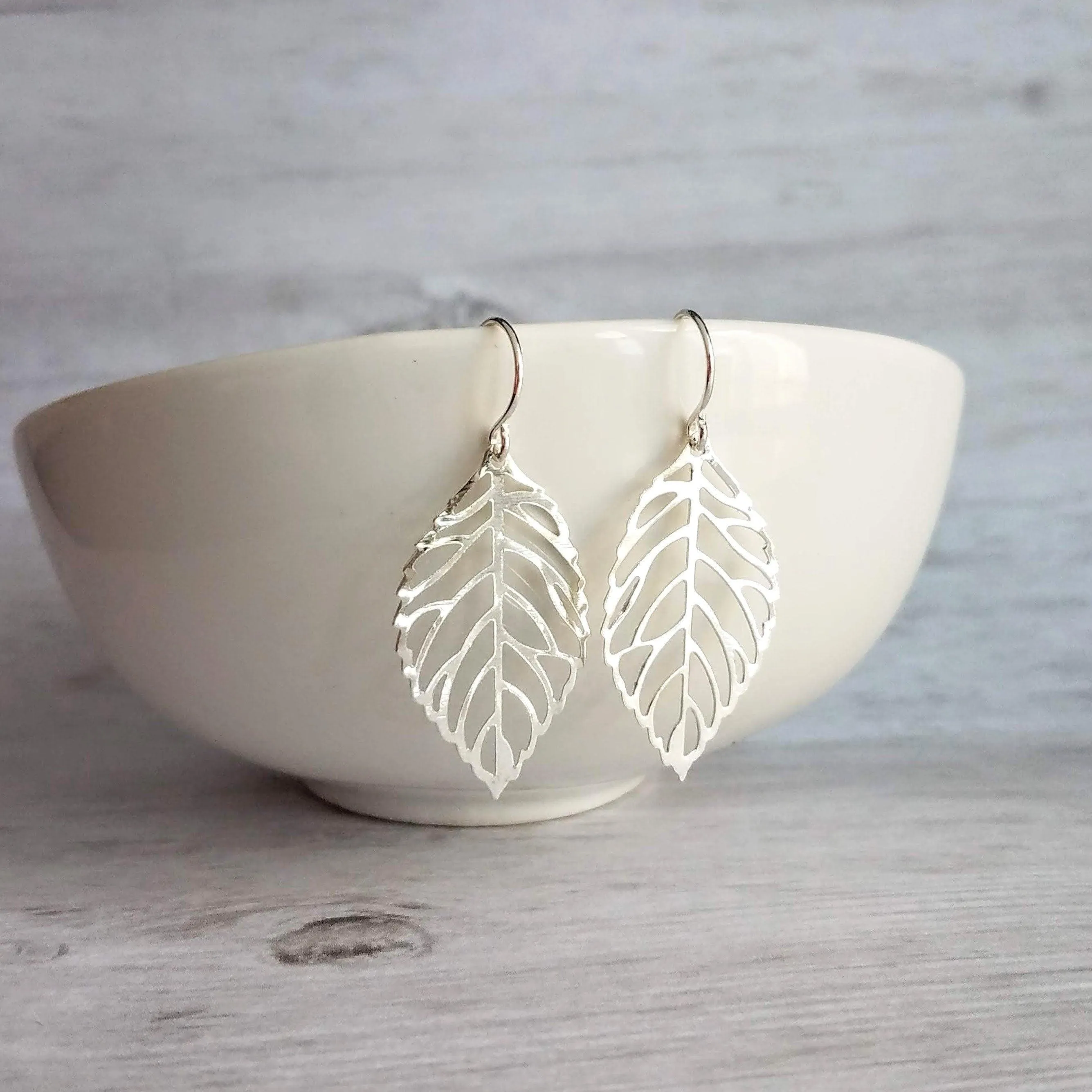 Silver Leaf Earrings - thin wispy modern outline filigree leaves - delicate cut out design - 14K SOLID GOLD or filled hook upgrade
