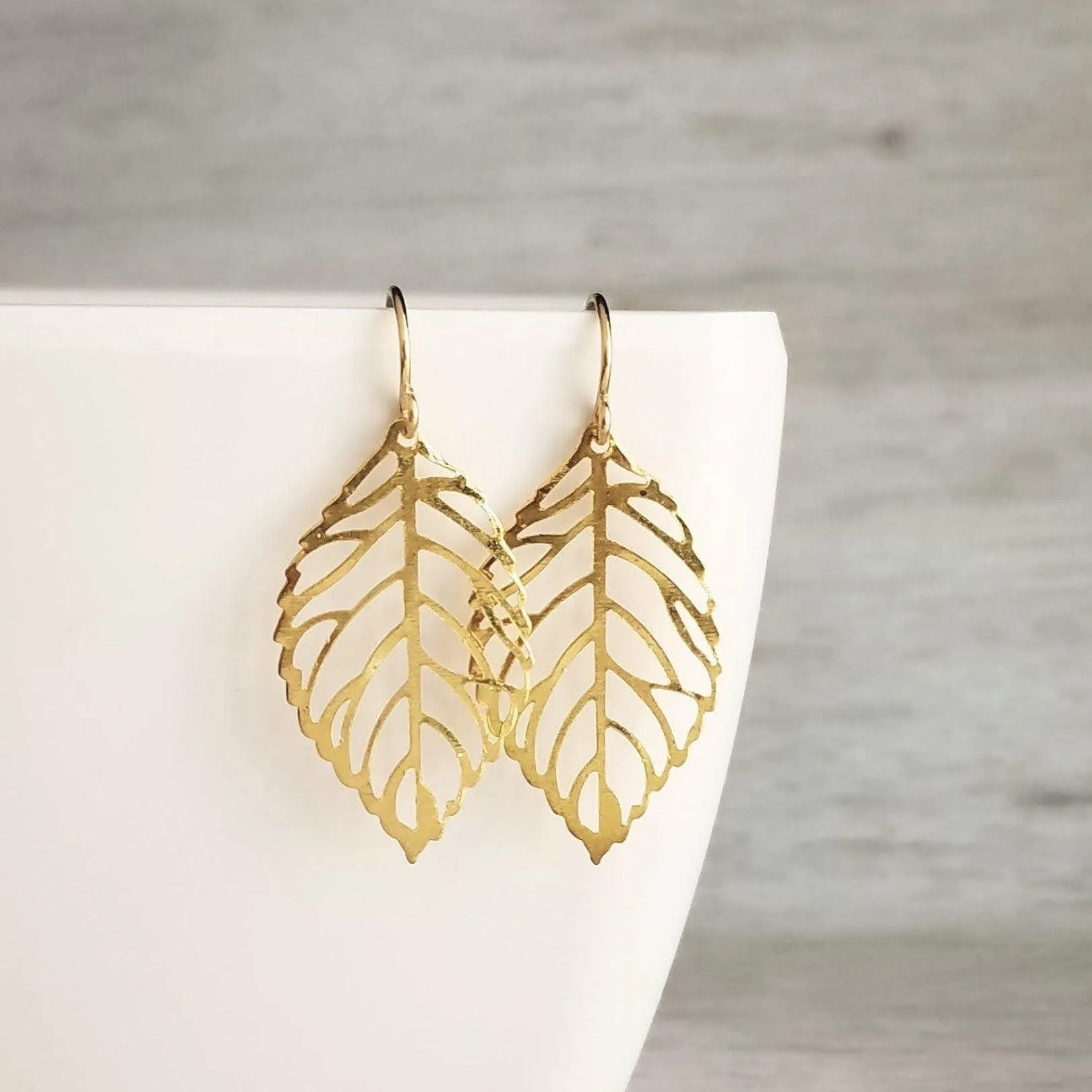 Silver Leaf Earrings - thin wispy modern outline filigree leaves - delicate cut out design - 14K SOLID GOLD or filled hook upgrade