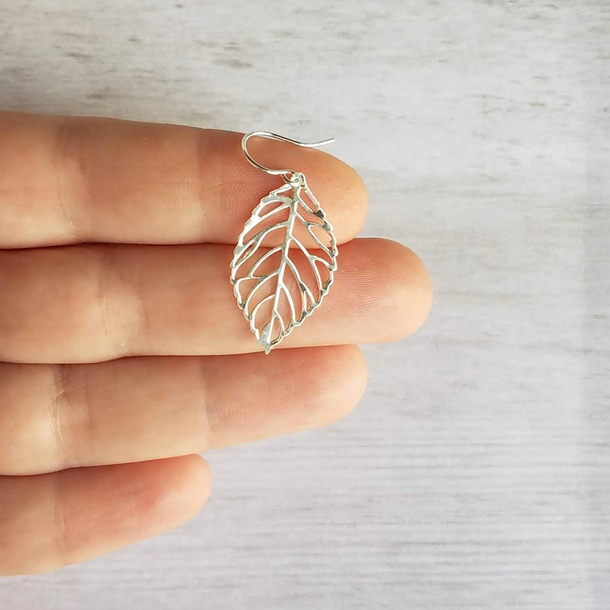 Silver Leaf Earrings - thin wispy modern outline filigree leaves - delicate cut out design - 14K SOLID GOLD or filled hook upgrade