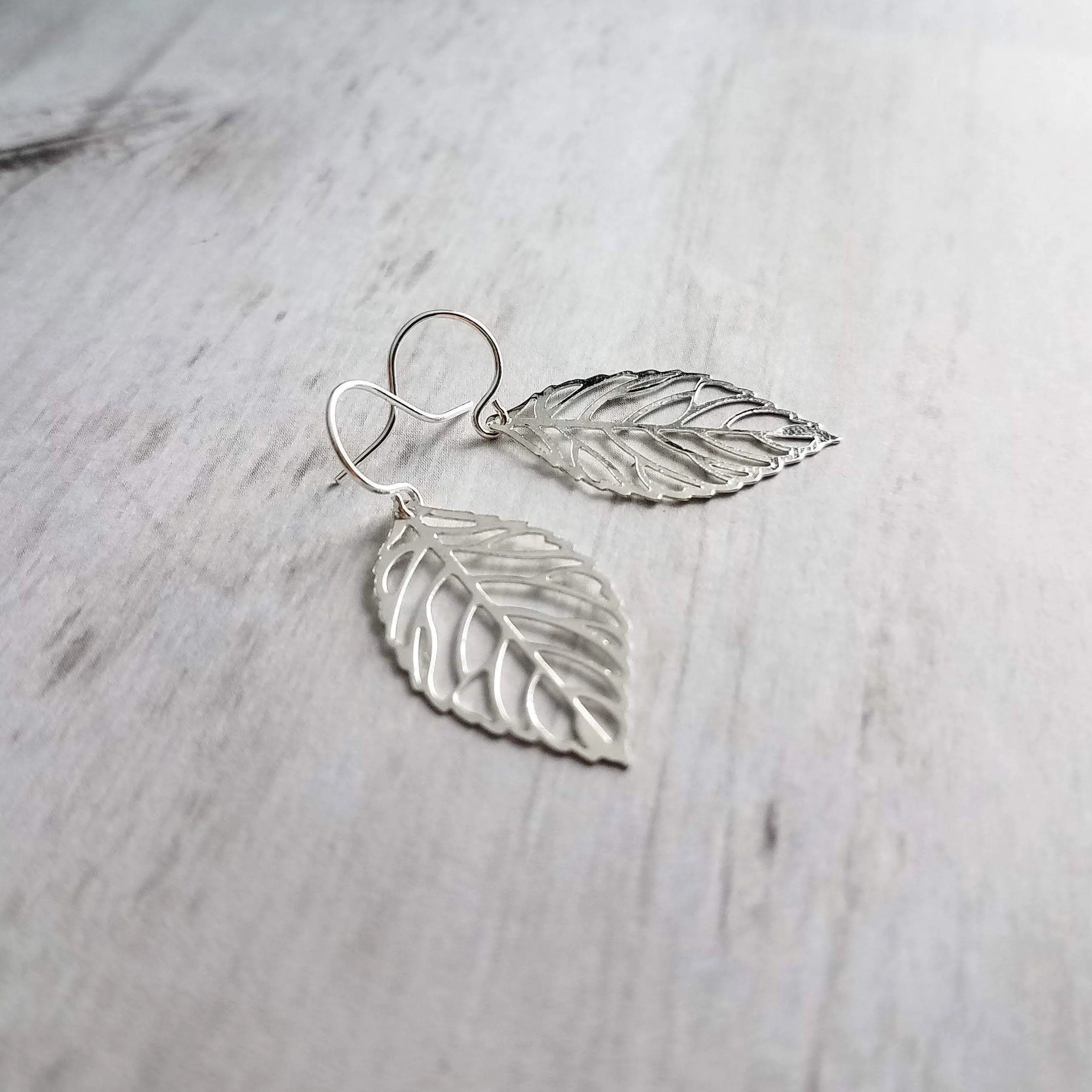 Silver Leaf Earrings - thin wispy modern outline filigree leaves - delicate cut out design - 14K SOLID GOLD or filled hook upgrade